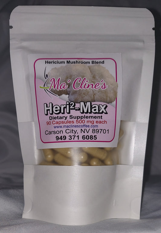 Photo of the bag and front label of Ma' Cline's Heri2~Max a dietary supplement. Lion's Mane Mushroom Blend 90 food capsules 500 mg each. www.maclinescoffee.com, Carson City, NV 89701, 949-371-6085, background photo of Lion's Mane, hericium erinaceus, which looks like a fuzzy lion's mane.