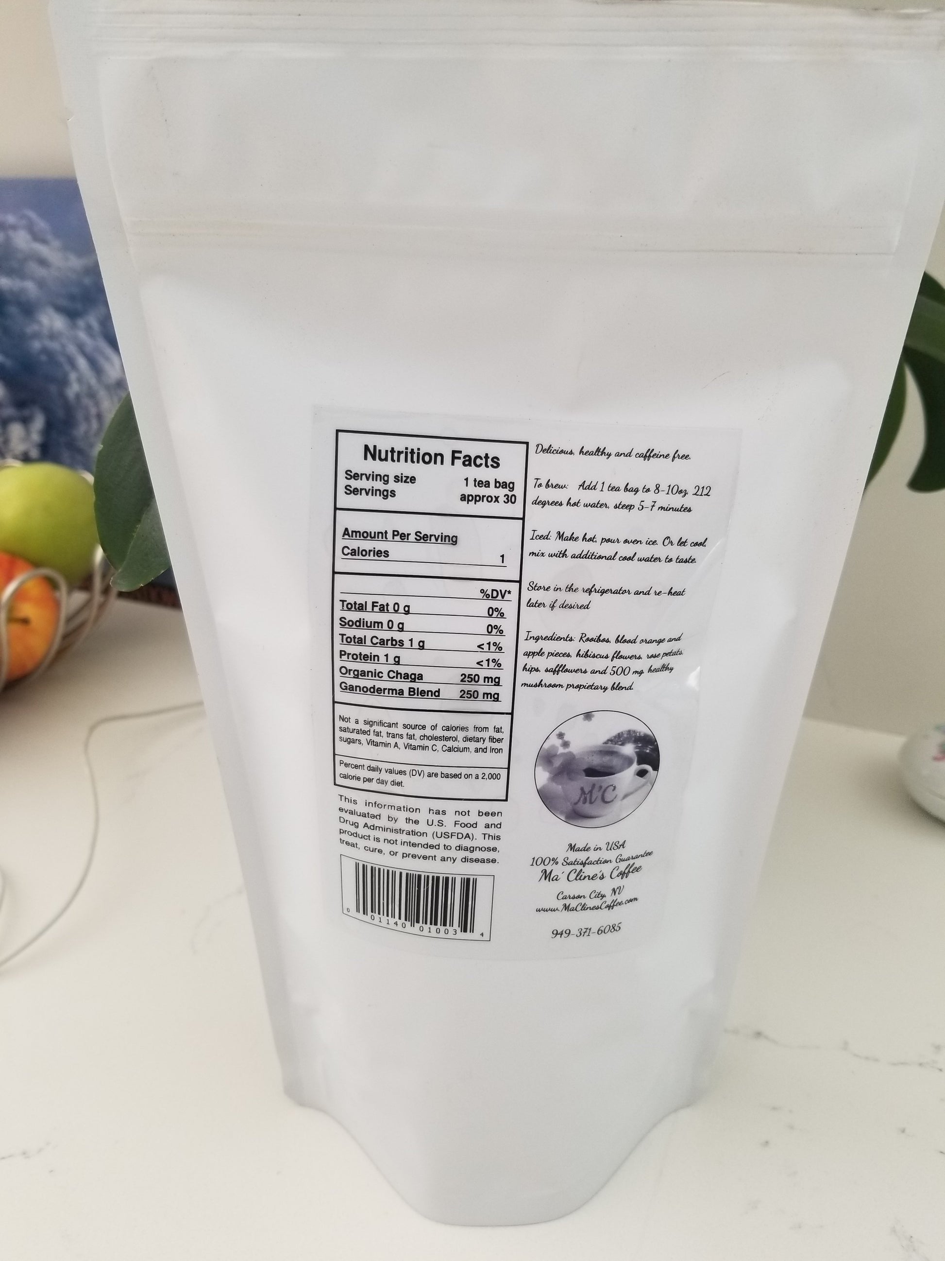White bag with rear label of Ma' Cline's delicious GanoCelebrate Chaga Rooibos Tea. Nutrition Facts and preparation instructions